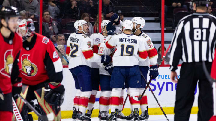 OTTAWA, ON - NOVEMBER 19: Florida Panthers Right Wing Troy Brouwer (22) and Florida Panthers Defenceman Mike Matheson (19) celebrate a goal with teammates during second period National Hockey League action between the Florida Panthers and Ottawa Senators on November 19, 2018, at Canadian Tire Centre in Ottawa, ON, Canada. (Photo by Richard A. Whittaker/Icon Sportswire via Getty Images)