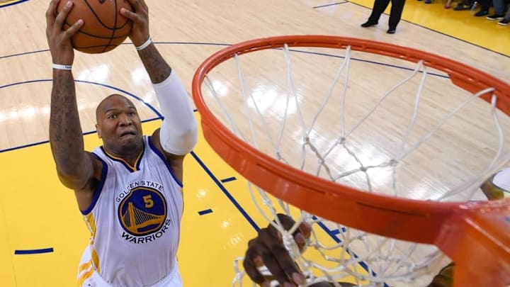 May 3, 2015; Oakland, CA, USA; Golden State Warriors center Marreese Speights (5) grabs a rebound during the fourth quarter in game one of the second round of the NBA Playoffs against the Memphis Grizzlies at Oracle Arena. The Warriors defeated the Grizzlies 101-86. Mandatory Credit: Kyle Terada-USA TODAY Sports