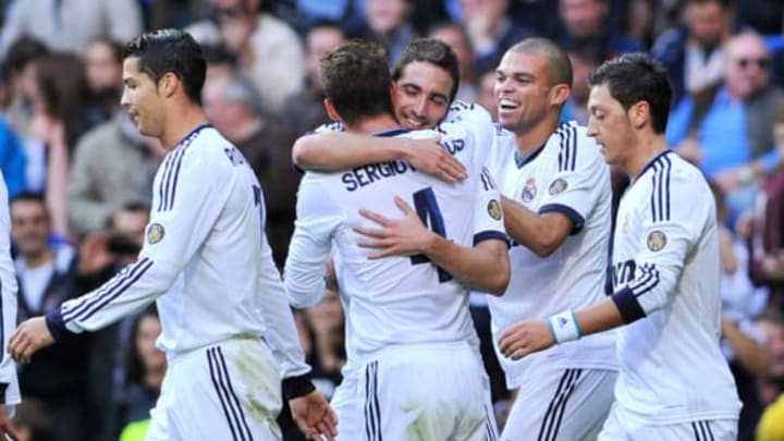 MADRID, SPAIN – OCTOBER 20: Gonzalo Higuain of Real Madrid CF celebrates scoring their first goal with teammates Cristiano Ronaldo (L), Sergio Ramos (2ndL), Pepe (2ndR) and Mezut Ozil (R) during the La Liga match between Real Madrid CF and RC Deportivo La Coruna at Bernabeu on October 20, 2012 in Madrid, Spain. (Photo by Gonzalo Arroyo Moreno/Getty Images)