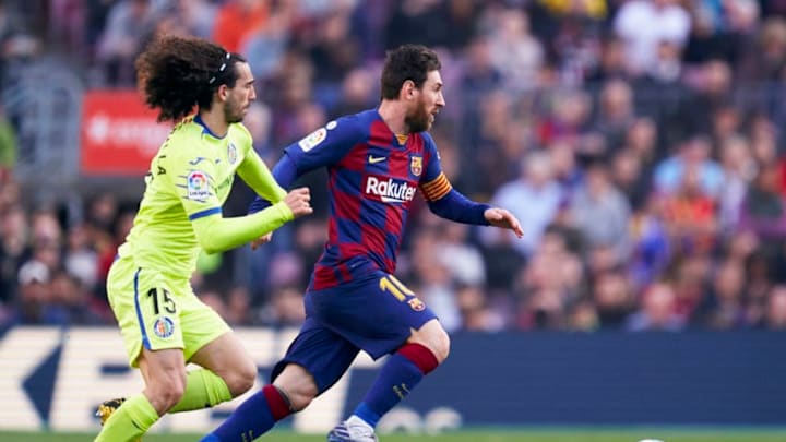 BARCELONA, SPAIN - FEBRUARY 15: Lionel Messi of FC Barcelona competes for the ball with Cucurella of Getafe CF during the La Liga match between FC Barcelona and Getafe CF at Camp Nou on February 15, 2020 in Barcelona, Spain. (Photo by Mateo Villalba/Quality Sport Images/Getty Images)