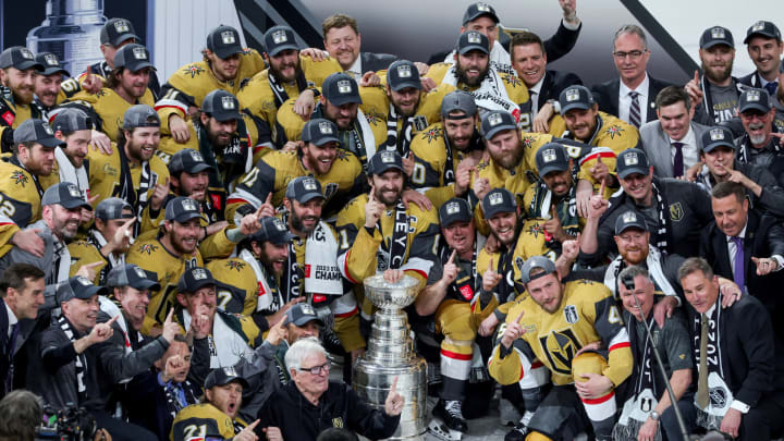 LAS VEGAS, NEVADA – JUNE 13: Team captain Mark Stone (C) #61 of the Vegas Golden Knights and teammates pose with the Stanley Cup after their 9-3 victory over the Florida Panthers in Game Five of the 2023 NHL Stanley Cup Final at T-Mobile Arena on June 13, 2023 in Las Vegas, Nevada. The Golden Knights won the series four games to one. (Photo by Ethan Miller/Getty Images)