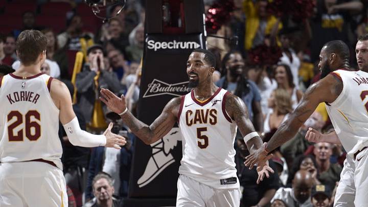 CLEVELAND, OH - NOVEMBER 7: JR Smith #5 of the Cleveland Cavaliers gives high five to teammates Kyle Korver #26 of the Cleveland Cavaliers and LeBron James #23 of the Cleveland Cavaliers on November 7, 2017 at Quicken Loans Arena in Cleveland, Ohio. NOTE TO USER: User expressly acknowledges and agrees that, by downloading and/or using this Photograph, user is consenting to the terms and conditions of the Getty Images License Agreement. Mandatory Copyright Notice: Copyright 2017 NBAE (Photo by David Liam Kyle/NBAE via Getty Images)