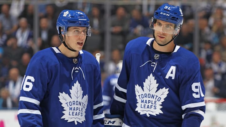 NHL DFS: TORONTO, ON - OCTOBER 3: John Tavares #91 and Mitchell Marner #16 of the Toronto Maple Leafs set up a play against the Montreal Canadiens during an NHL game at Scotiabank Place on October 3, 2018 in Toronto, Ontario, Canada. (Photo by Claus Andersen/Getty Images)