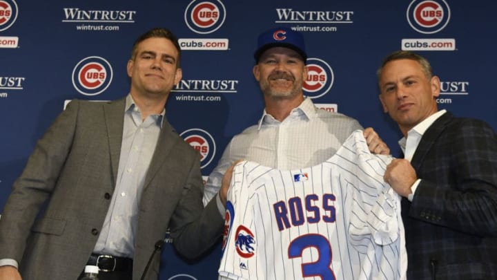 CHICAGO, ILLINOIS - OCTOBER 28: Theo Epstein, president of baseball operations of the Chicago Cubs, (L) David Ross, new manager of the Chicago Cubs (C) and Jed Hoyer, general manager of the Cubs (R) pose for a photo as Ross is introduced to the media at Wrigley Field on October 28, 2019 in Chicago, Illinois. (Photo by David Banks/Getty Images)