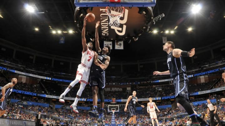 ORLANDO, FL - MARCH 30: Justin Holiday #7 of the Chicago Bulls handles the ball against the Orlando Magic on March 30, 2018 at Amway Center in Orlando, Florida. NOTE TO USER: User expressly acknowledges and agrees that, by downloading and or using this photograph, User is consenting to the terms and conditions of the Getty Images License Agreement. Mandatory Copyright Notice: Copyright 2018 NBAE (Photo by Fernando Medina/NBAE via Getty Images)