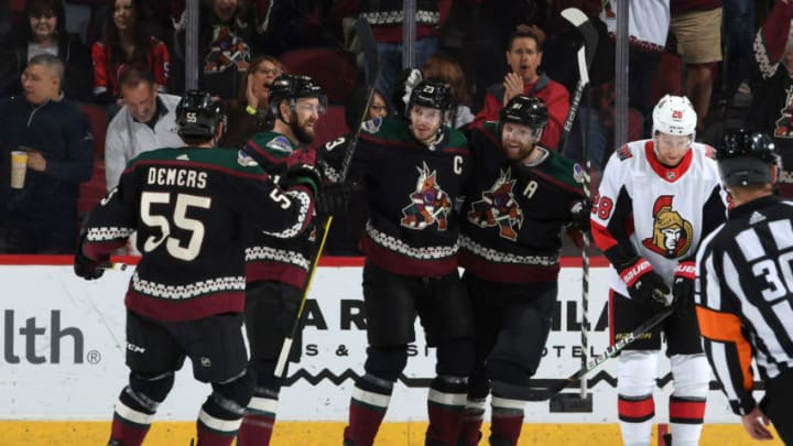 GLENDALE, ARIZONA - OCTOBER 19: Oliver Ekman-Larsson #23 of the Arizona Coyotes celebrates with teammates Jason Demers #55, Derek Stepan #21 and Phil Kessel #81 after scoring a goal against the Ottawa Senators during the first period at Gila River Arena on October 19, 2019 in Glendale, Arizona. (Photo by Norm Hall/NHLI via Getty Images)