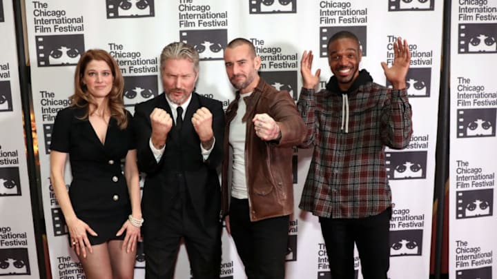 CHICAGO, ILLINOIS - OCTOBER 18: Sarah Brooks, Travis Stevens, Phil 'CM Punk' Brooks, and Travis Delgado attend the red carpet Premiere of "Girl on the Third Floor" at the Chicago International Film Festival on October 18, 2019 in Chicago, Illinois. (Photo by Robin Marchant/Getty Images for Queensbury Pictures / Dark Sky Films)