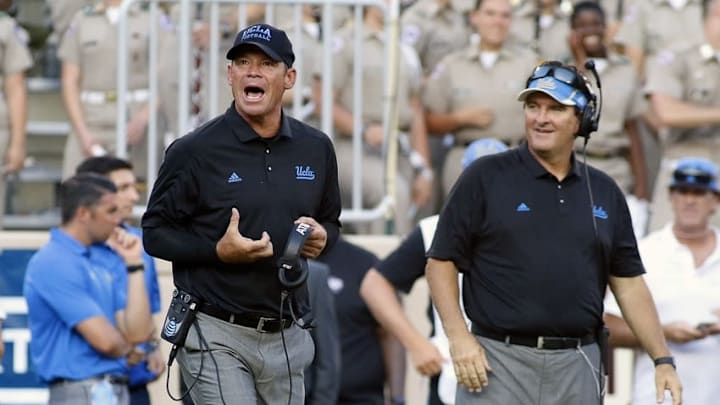 Sep 3, 2016; College Station, TX, USA; UCLA Bruins head coach Jim Mora urges a call against the Texas A&M Aggies during overtime at Kyle Field. Texas A&M won in overtime 31-24. Mandatory Credit: Ray Carlin-USA TODAY Sports