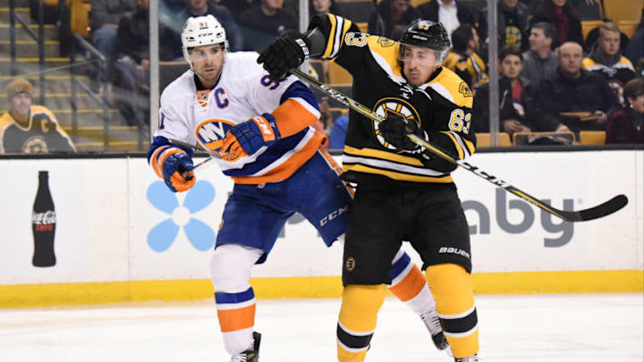 BOSTON, MA - DECEMBER 20: John Tavares #91 of the New York Islanders against Brad Marchand #63 of the Boston Bruins at the TD Garden on December 20, 2016 in Boston, Massachusetts. (Photo by Brian Babineau/NHLI via Getty Images)