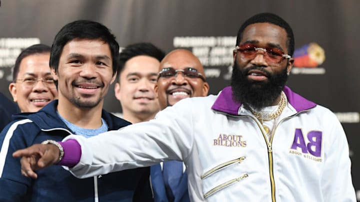 LAS VEGAS, NEVADA - JANUARY 16: WBA welterweight champion Manny Pacquiao (L) and Adrien Broner pose during a news conference at MGM Grand Hotel & Casino on January 16, 2019 in Las Vegas, Nevada. Pacquiao will defend his title against Broner on January 19 at MGM Grand Garden Arena in Las Vegas. (Photo by Ethan Miller/Getty Images)