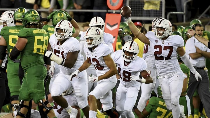 EUGENE, OR – SEPTEMBER 22: Linebacker Sean Barton (27) of the Stanford Cardinal runs off the field with a fumble recovery in the fourth quarter of the game against the Oregon Ducks at Autzen Stadium on September 22, 2018 in Eugene, Oregon. Stanford won the game in overtime 38-31. (Photo by Steve Dykes/Getty Images)