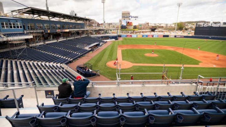 WORCESTER - Two gentlemen sit in the stands during a sim game at the Red Sox alternate site at Polar Park on Friday, April 30, 2021.Loc Stadiums 1