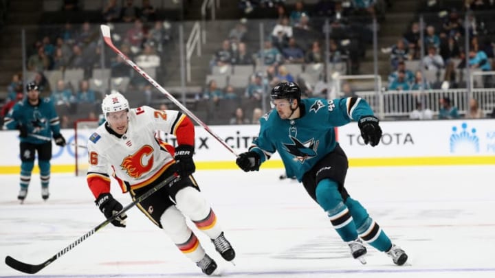 SAN JOSE, CA - SEPTEMBER 27: Tomas Hertl #48 of the San Jose Sharks in action against Michael Stone #26 of the Calgary Flames during their preseason game at SAP Center on September 27, 2018 in San Jose, California. (Photo by Ezra Shaw/Getty Images)