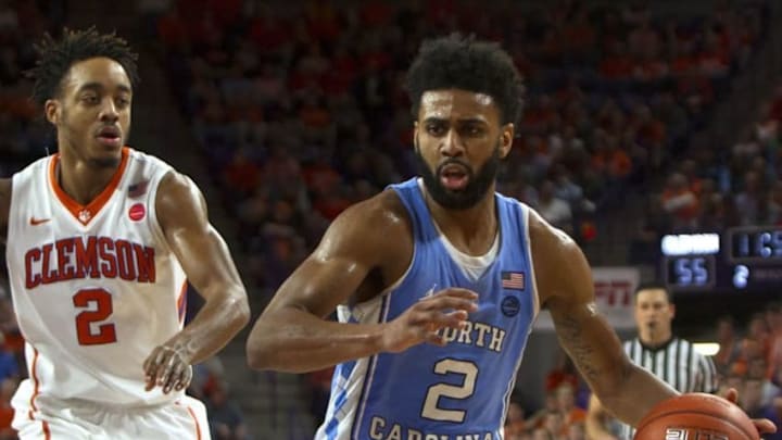 Jan 3, 2017; Clemson, SC, USA; North Carolina Tar Heels guard Joel Berry II (2) drives to the basket while being defended by Clemson Tigers guard Marcquise Reed (2) during the second half at Littlejohn Coliseum. Mandatory Credit: Joshua S. Kelly-USA TODAY Sports