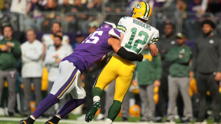 MINNEAPOLIS, MN - OCTOBER 15: Anthony Barr No. 55 of the Minnesota Vikings hits quarterback Aaron Rodgers No. 12 of the Green Bay Packers during the first quarter of the game on October 15, 2017 at US Bank Stadium in Minneapolis, Minnesota. (Photo by Adam Bettcher/Getty Images)