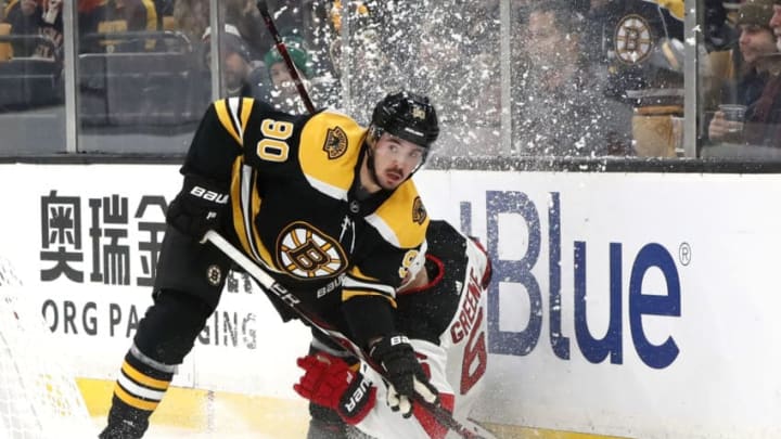 BOSTON, MA - MARCH 02: Boston Bruins left wing Marcus Johansson (90) looks to pass as New Jersey Devils defenseman Andy Greene (6) hits the deck during a game between the Boston Bruins and the New Jersey Devils on March 2, 2019, at TD Garden in Boston, Massachusetts. (Photo by Fred Kfoury III/Icon Sportswire via Getty Images)