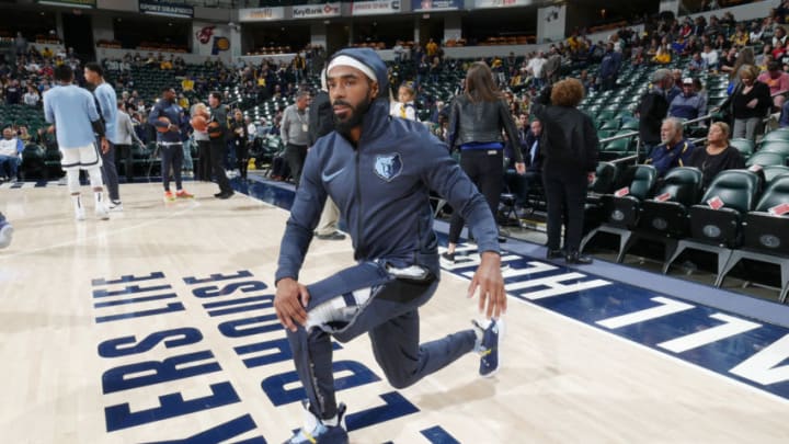 INDIANAPOLIS, IN - OCTOBER 17: Mike Conley #11 of the Memphis Grizzlies stretches prior to the game against the Indiana Pacers during the game on October 17, 2018 at Bankers Life Fieldhouse in Indianapolis, Indiana. NOTE TO USER: User expressly acknowledges and agrees that, by downloading and or using this Photograph, user is consenting to the terms and conditions of the Getty Images License Agreement. Mandatory Copyright Notice: Copyright 2018 NBAE (Photo by Ron Hoskins/NBAE via Getty Images)
