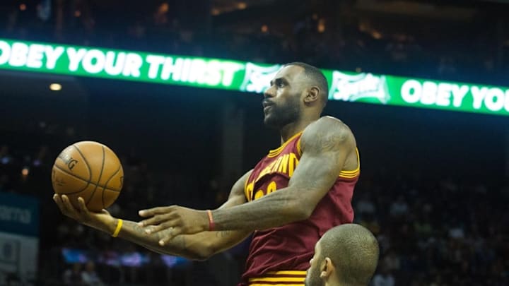 Nov 27, 2015; Charlotte, NC, USA; Cleveland Cavaliers forward LeBron James (23) shoots the ball in the first half against the Charlotte Hornets at Time Warner Cable Arena. Mandatory Credit: Jeremy Brevard-USA TODAY Sports