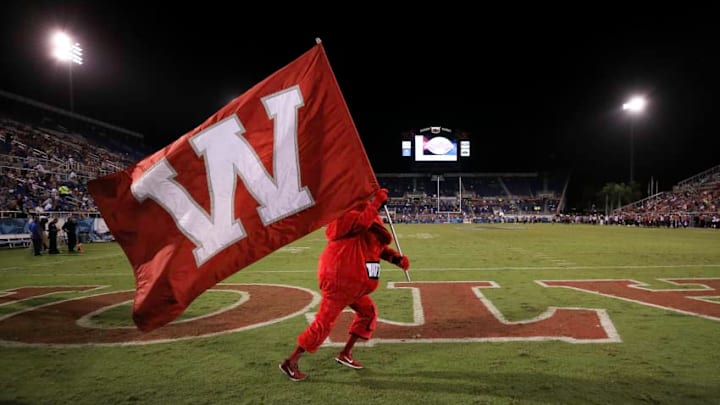BOCA RATON, FL - DECEMBER 20: The Western Kentucky Hilltoppers mascot Big Red carries a flag during the game against the Memphis Tigers at FAU Stadium on December 20, 2016 in Boca Raton, Florida. (Photo by Rob Foldy/Getty Images)