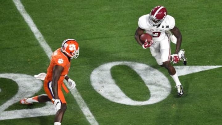 Jan 11, 2016; Glendale, AZ, USA; Alabama Crimson Tide wide receiver Calvin Ridley (3) runs the ball against Clemson Tigers cornerback Mackensie Alexander (2) during the first quarter in the 2016 CFP National Championship at University of Phoenix Stadium. Mandatory Credit: Gary A. Vasquez-USA TODAY Sports