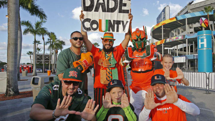MIAMI GARDENS, FL - NOVEMBER 29: Miami Hurricanes fans wait for the teams arrival prior to the game against the Pittsburgh Panthers on November 29, 2014 at Sun Life Stadium in Miami Gardens, Florida. (Photo by Joel Auerbach/Getty Images)