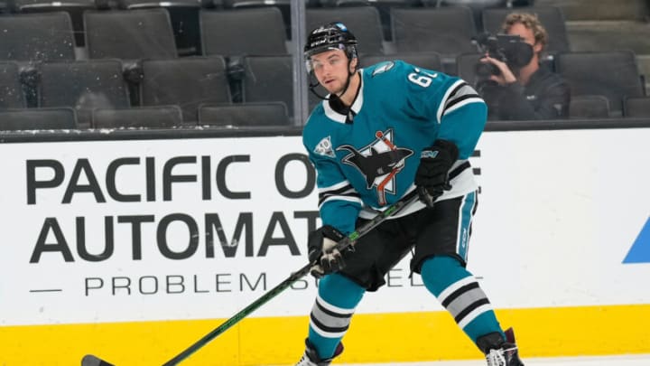 May 8, 2021; San Jose, California, USA; San Jose Sharks right wing Kevin Labanc (62) looks to pass the puck during the third period against the Arizona Coyotes at SAP Center at San Jose. Mandatory Credit: Stan Szeto-USA TODAY Sports