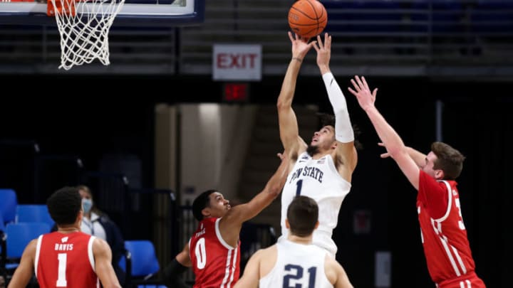 Jan 30, 2021; University Park, Pennsylvania, USA; Penn State Nittany Lions forward Seth Lundy (1) shoots the ball as Wisconsin Badgers guard D'Mitrik Trice (0) defends during the first half at Bryce Jordan Center. Mandatory Credit: Matthew OHaren-USA TODAY Sports