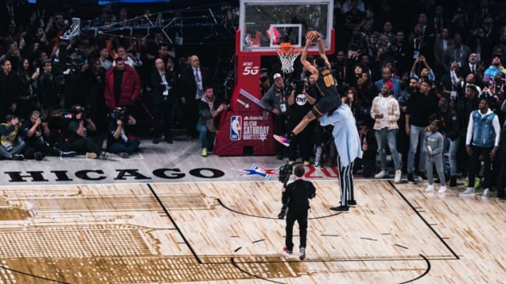 Aaron Gordon dunks the ball over Tacko Fall, SGA OKC Thunder Skills Challenge at the 2020 State Farm All-Star Saturday Night (Photo by Lampson Yip - Clicks Images/Getty Images)