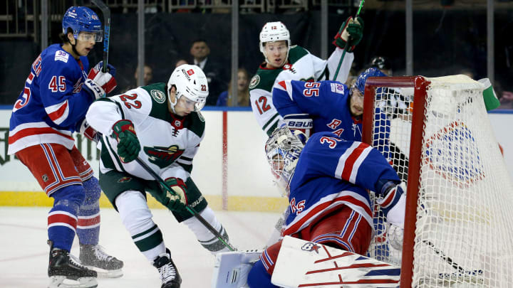 Jan 28, 2022; New York, New York, USA; New York Rangers goaltender Igor Shesterkin (31) makes a save against Minnesota Wild left wing Kevin Fiala (22) during the first period at Madison Square Garden. Mandatory Credit: Brad Penner-USA TODAY Sports
