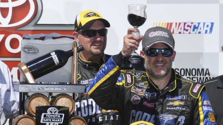 June 26, 2016; Sonoma, CA, USA; Sprint Cup Series driver Tony Stewart (14) celebrates in victory lane during the Toyota Save Mart 350 at Sonoma Raceway. Mandatory Credit: Kyle Terada-USA TODAY Sports