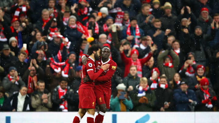 LIVERPOOL, ENGLAND - DECEMBER 10: Mohamed Salah of Liverpool celebrates scoring the first Liverpool goal with Sadio Mane of Liverpool during the Premier League match between Liverpool and Everton at Anfield on December 10, 2017 in Liverpool, England. (Photo by Clive Brunskill/Getty Images)