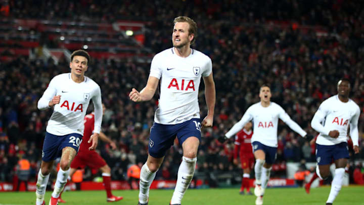 LIVERPOOL, ENGLAND - FEBRUARY 04: Harry Kane of Tottenham Hotspur celebrates after scoring his sides second goal and his 100th Premier League goal during the Premier League match between Liverpool and Tottenham Hotspur at Anfield on February 4, 2018 in Liverpool, England. (Photo by Clive Brunskill/Getty Images)