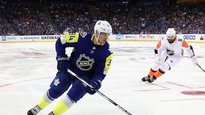 TAMPA, FL - JANUARY 28: Auston Matthews #34 of the Toronto Maple Leafs skates past Drew Doughty #8 of the Los Angeles Kings. (Photo by Bruce Bennett/Getty Images)