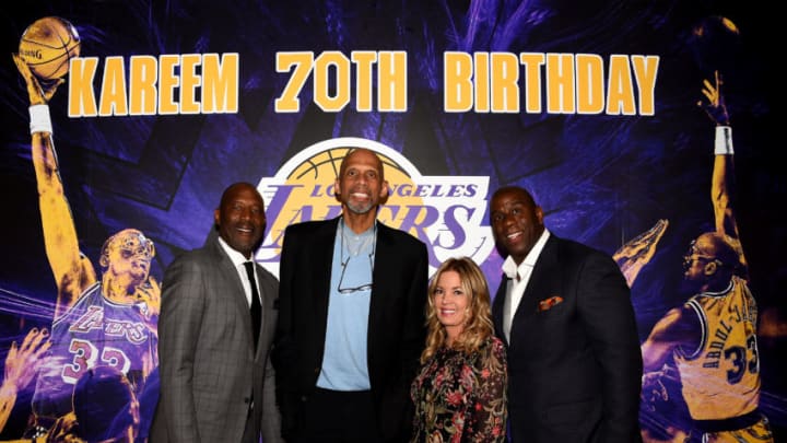 LOS ANGELES, CA - APRIL 11: (left to right) Former Lakers teammates James Worthy, Kareem Abdul Jabbar and Jeanie Buss, controlling owner and president of the Los Angeles Lakers and Earvin "Magic" Johnson pose for a photo during Kareem Abdul Jabbar's 70th birthday celebration on April 11, 2017 at Staples Centers in Los Angeles, California. NOTE TO USER: User expressly acknowledges and agrees that, by downloading and/or using this Photograph, user is consenting to the terms and conditions of the Getty Images License Agreement. Mandatory Copyright Notice: Copyright 2017 NBAE (Photo by Juan Ocampo/NBAE via Getty Images)