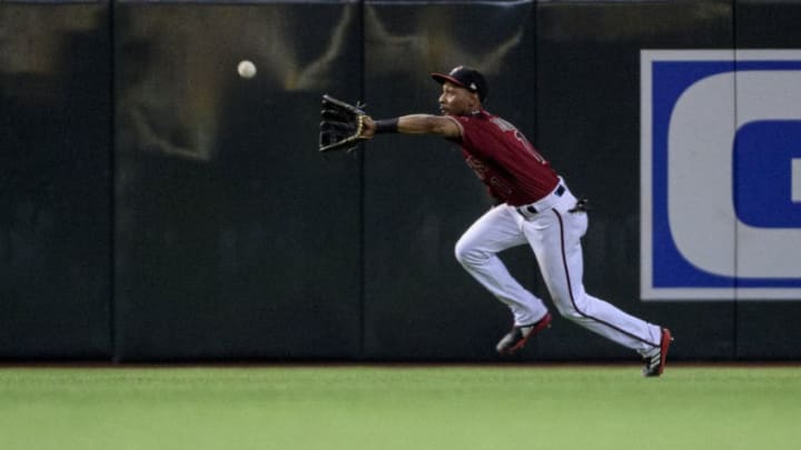 PHOENIX, ARIZONA - SEPTEMBER 18: Jarrod Dyson #1 of the Arizona Diamondbacks catches a fly ball sixth inning of the MLB game against the Miami Marlins at Chase Field on September 18, 2019 in Phoenix, Arizona. (Photo by Jennifer Stewart/Getty Images)