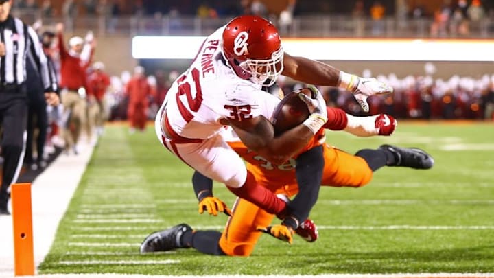 Nov 28, 2015; Stillwater, OK, USA; Oklahoma Sooners running back Samaje Perine dives into the end zone for a touchdown against the Oklahoma State Cowboys in the second quarter at Boone Pickens Stadium. Mandatory Credit: Mark J. Rebilas-USA TODAY Sports