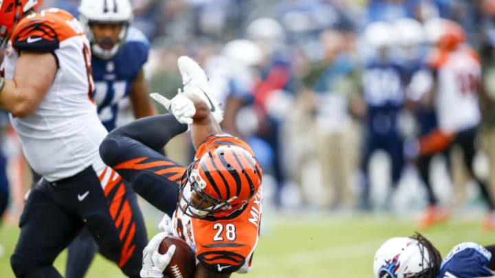 NASHVILLE, TN - NOVEMBER 12: Running Back Joe Mixon #28 of the Cincinnati Bengals carries the ball against the Tennessee Titans at Nissan Stadium on November 12, 2017 in Nashville, Tennessee. (Photo by Wesley Hitt/Getty Images)