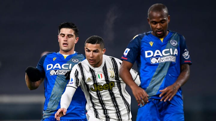 ALLIANZ STADIUM, TURIN, ITALY - 2021/01/03: Cristiano Ronaldo (C) of Juventus FC celebrates after scoring a goal as Kevin Bonifazi (L) and Samir Gaetano de Souza Santos of Udinese Calcio look dejected during the Serie A football match between Juventus FC and Udinese Calcio. Juventus FC won 4-1 over Udinese Calcio. (Photo by Nicolò Campo/LightRocket via Getty Images)