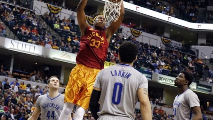 Apr 10, 2016; Indianapolis, IN, USA; Indiana Pacers center Myles Turner (33) dunks against Brooklyn Nets guard Shane Larkin (0) at Bankers Life Fieldhouse. Indiana defeats Brooklyn 129-105. Mandatory Credit: Brian Spurlock-USA TODAY Sports