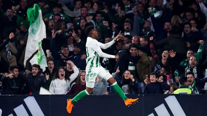 SEVILLE, SPAIN - FEBRUARY 18: Junior Firpo of Real Betis Balompie celebrates after Nacho Fernandez of Real Madrid scored an own goal during the La Liga match between Real Betis and Real Madrid at Benito Villamrin stadium on February 18, 2018 in Seville, Spain. (Photo by Aitor Alcalde/Getty Images)