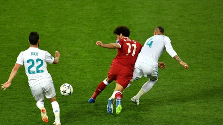 KIEV, UKRAINE - MAY 26: Mohamed Salah of Liverpool falls and lands on his shoulder after a collision with Sergio Ramos of Real Madrid, leading to him going off injured during the UEFA Champions League Final between Real Madrid and Liverpool at NSC Olimpiyskiy Stadium on May 26, 2018 in Kiev, Ukraine. (Photo by Mike Hewitt/Getty Images)