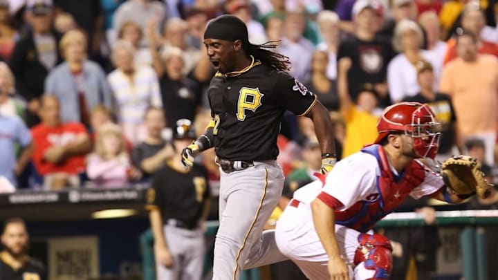 Sep 10, 2014; Philadelphia, PA, USA; Pittsburgh Pirates center fielder Andrew McCutchen (22) reacts as he crosses home plater after hitting an inside the park home run during the fifth inning a game against the Philadelphia Phillies at Citizens Bank Park. Mandatory Credit: Bill Streicher-USA TODAY Sports
