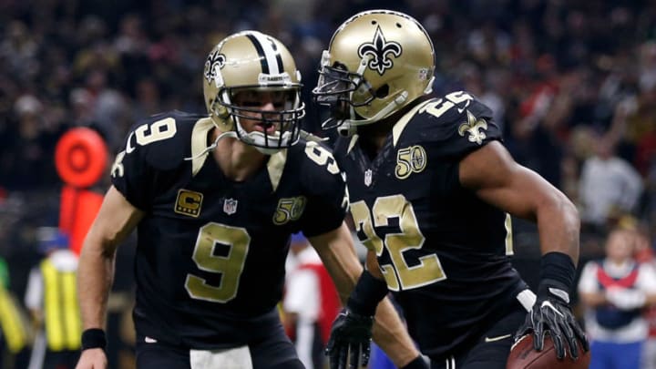 NEW ORLEANS, LA - DECEMBER 24: Drew Brees #9 and Mark Ingram #22 of the New Orleans Saints celebrate after a touchdown against the Tampa Bay Buccaneers at the Mercedes-Benz Superdome on December 24, 2016 in New Orleans, Louisiana. (Photo by Jonathan Bachman/Getty Images)