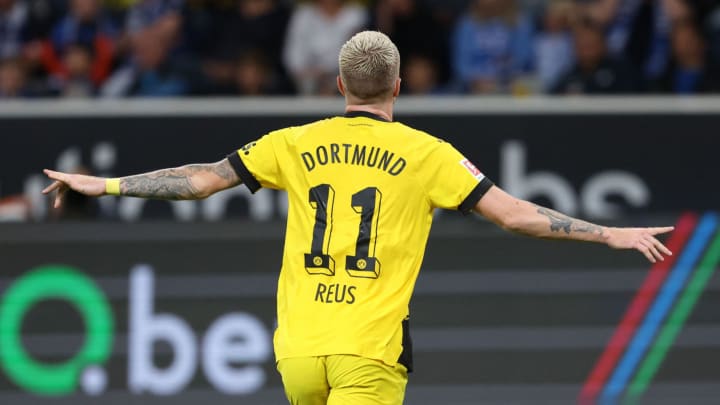 Dortmund’s German forward #11 Marco Reus celebrates scoring the 1-2 goal during the German first division Bundesliga football match TSG 1899 Hoffenheim v BVB Borussia Dortmund in Sinsheim, southwestern Germany, on September 29, 2023. (Photo by Daniel ROLAND / AFP) / RESTRICTIONS: DFL REGULATIONS PROHIBIT ANY USE OF PHOTOGRAPHS AS IMAGE SEQUENCES AND/OR QUASI-VIDEO (Photo by DANIEL ROLAND/AFP via Getty Images)