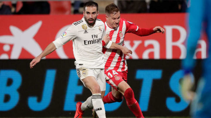 GIRONA, SPAIN - JANUARY 31: (L-R) Dani Carvajal of Real Madrid, Raul Garcia of Girona during the Spanish Copa del Rey match between Girona v Real Madrid at the Estadi Municipal Montilivi on January 31, 2019 in Girona Spain (Photo by Jeroen Meuwsen/Soccrates/Getty Images) GIRONA, SPAIN - JANUARY 31: (L-R) Dani Carvajal of Real Madrid, Raul Garcia of Girona during the Spanish Copa del Rey match between Girona v Real Madrid at the Estadi Municipal Montilivi on January 31, 2019 in Girona Spain (Photo by Jeroen Meuwsen/Soccrates/Getty Images)
