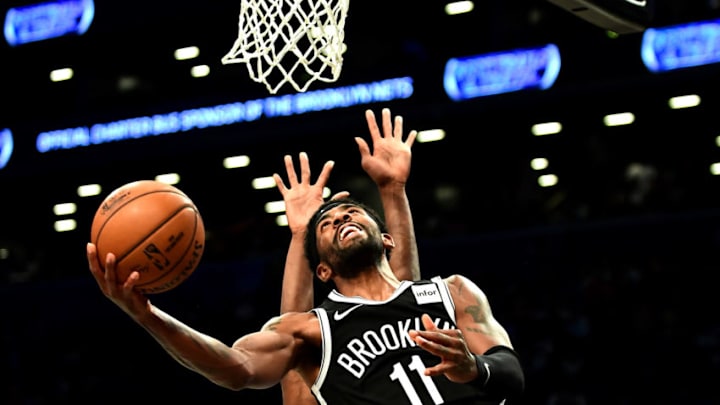NEW YORK, NEW YORK - OCTOBER 23: Kyrie Irving #11 of the Brooklyn Nets goes in for a layup during the first half of their game against the Minnesota Timberwolves at Barclays Center on October 23, 2019 in the Brooklyn borough of New York City. NOTE TO USER: User expressly acknowledges and agrees that, by downloading and or using this photograph, User is consenting to the terms and conditions of the Getty Images License Agreement. (Photo by Emilee Chinn/Getty Images)