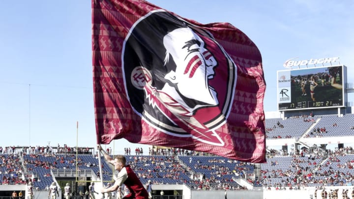 ORLANDO, FL - APRIL 9: A Cheerleader of the Florida State Seminoles waves a flag during the Spring Game at the Florida Citrus Bowl in Orlando, Florida on April 9, 2016 in Orlando, Florida. (Photo by Don Juan Moore/Getty Images)