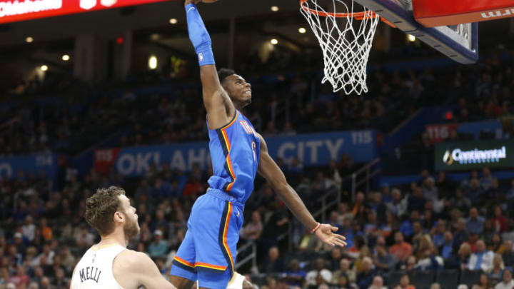 Hamidou Diallo #6 of the Oklahoma City Thunder slam dunks against Nicolo Melli #20 of the New Orleans Pelicans (Photo by Ron Jenkins/Getty Images)