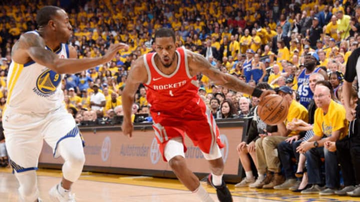 OAKLAND, CA – MAY 20: Trevor Ariza #1 of the Houston Rockets handles the ball against the Golden State Warriors during Game Three of the Western Conference Finals during the 2018 NBA Playoffs on May 20, 2018 at ORACLE Arena in Oakland, California. NOTE TO USER: User expressly acknowledges and agrees that, by downloading and/or using this Photograph, user is consenting to the terms and conditions of the Getty Images License Agreement. Mandatory Copyright Notice: Copyright 2018 NBAE (Photo by Andrew D. Bernstein/NBAE via Getty Images)