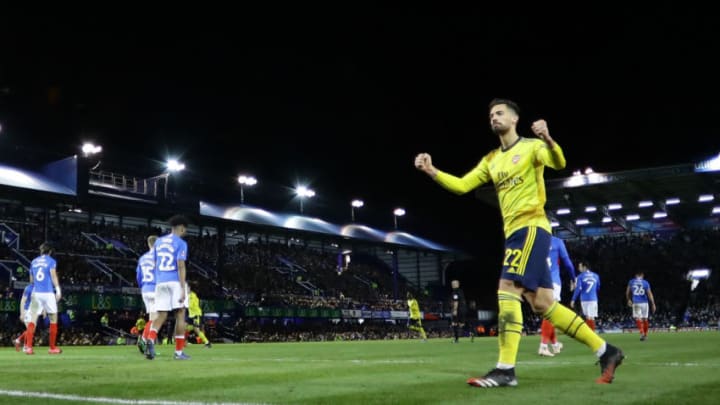 PORTSMOUTH, ENGLAND - MARCH 02: Pablo Mari of Arsenal celebrates after his teammate Sokratis Papastathopoulos of Arsenal (not pictured) scored their team's first goal during the FA Cup Fifth Round match between Portsmouth FC and Arsenal FC at Fratton Park on March 02, 2020 in Portsmouth, England. (Photo by Richard Heathcote/Getty Images)